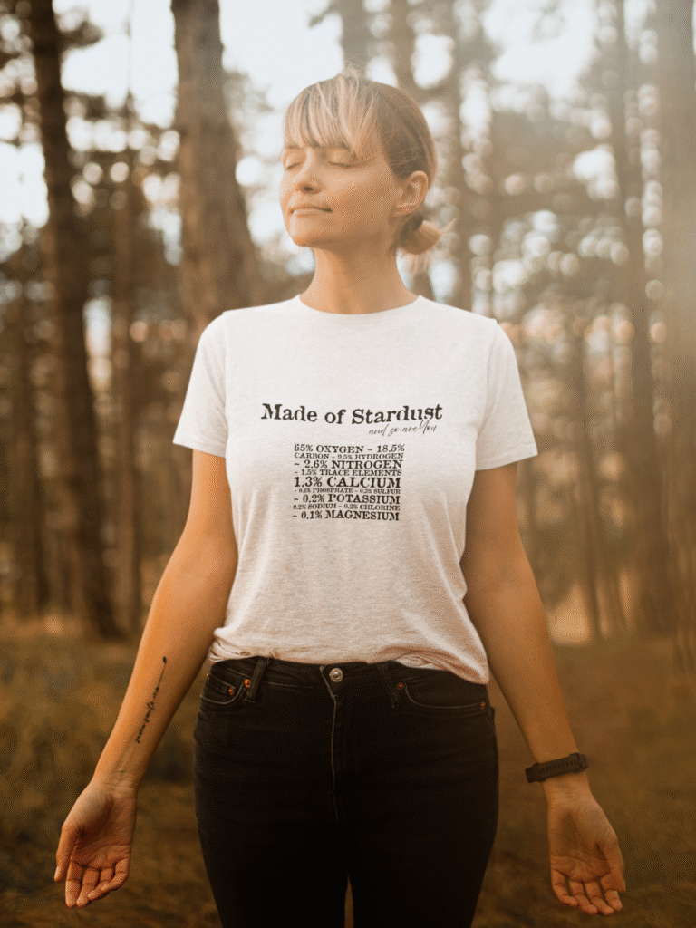 made-of-stardust-t-shirt-woman-meditating-outdoors